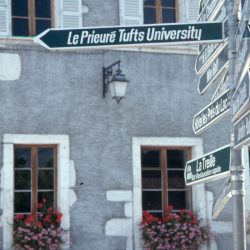 A sign in Talloires indicating "Le Prieure Tufts University"