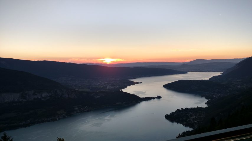 The sun setting over Lake Annecy